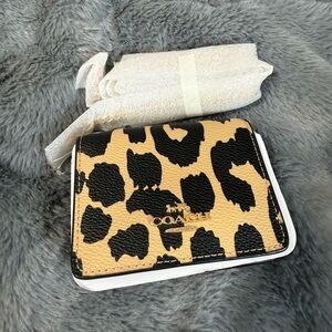 Coach Black and Tan Animal Print Wallet